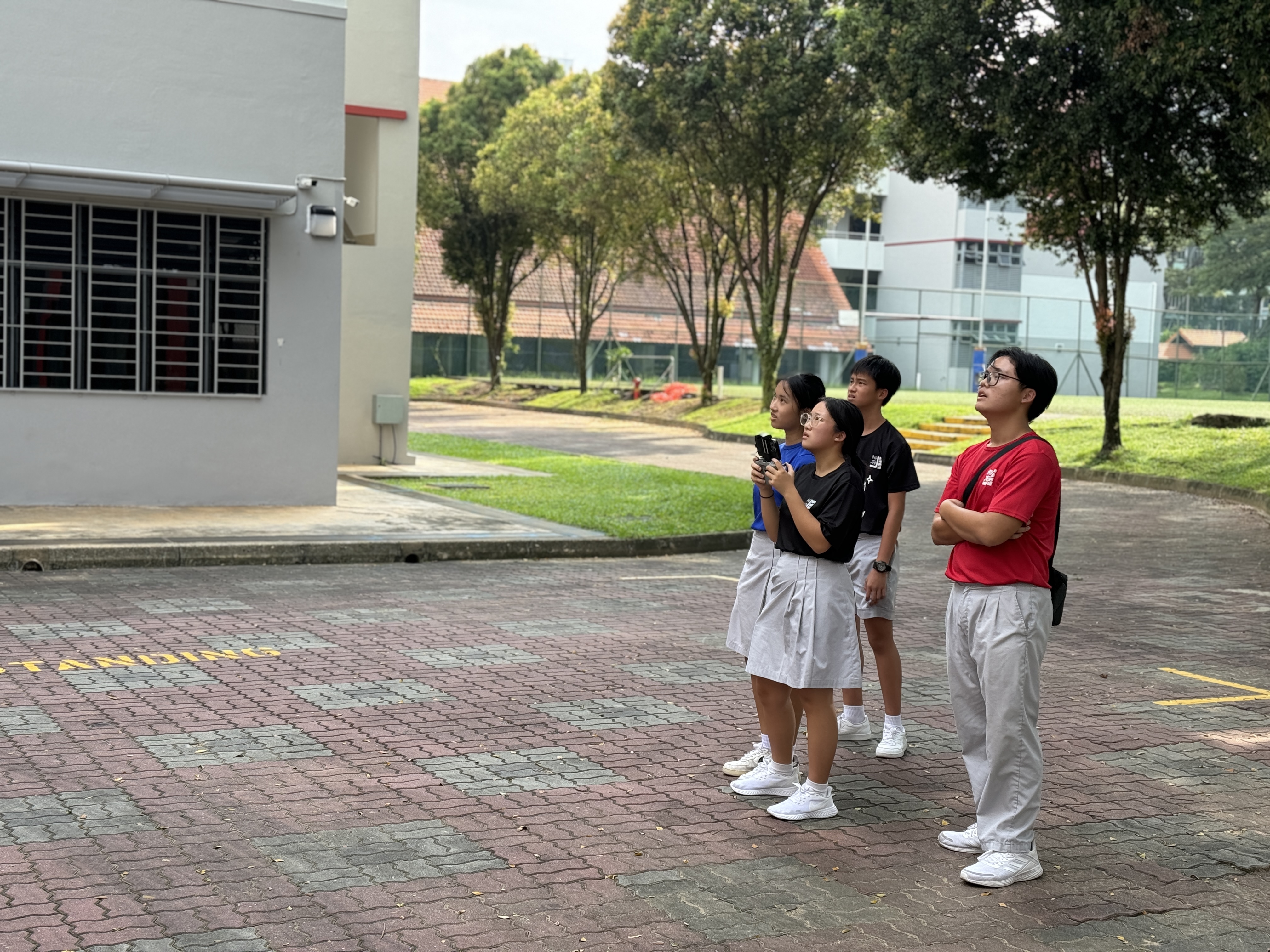 Learning how to fly a drone during IQ camp